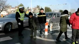Elders stop wedding cars on road in group