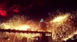 Taoist Chinese New Year tradition involves lighting fireworks with liquid hot iron