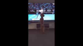 This dog likes to watch tennis!