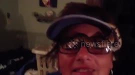 Snake crawls under ladies eye glasses