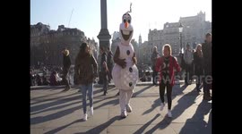 Buskers Entertain Tourists in Trafalgar Square,London,UK