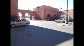4. Traffic through the walls of the old town, Marrakech, Morocco.