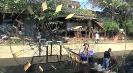 Canal cleanup in Chiang Mai, Thailand using renewable and recyclable materials