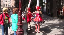 Bizarrely dressed transvestites in Amsterdam's red light district